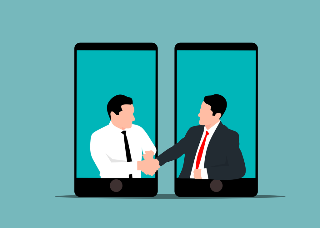 Two Business Men shaking hands from two mobile phones vector